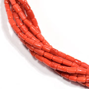 Twisted necklace in red coral and round clasp